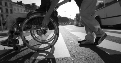 Belgium - Namur 2004 : Living in a  wheelchair (PHOTO/REPORTERS  John Thys)  Model Release Cf/ Car for handicapped persons -  Physically - Disability - Social Security - Social Insurance - Mutual - Mutuality - Wheelchair - Physical disability - Social Security - Social Insurance  -  Medical wheel chair -  Accident - Paralysis - Paralysed - Invalid disabled person - Security safety - Belt seat - Transport - Phone Booth  - Phone Booth inadapted for the disabled person