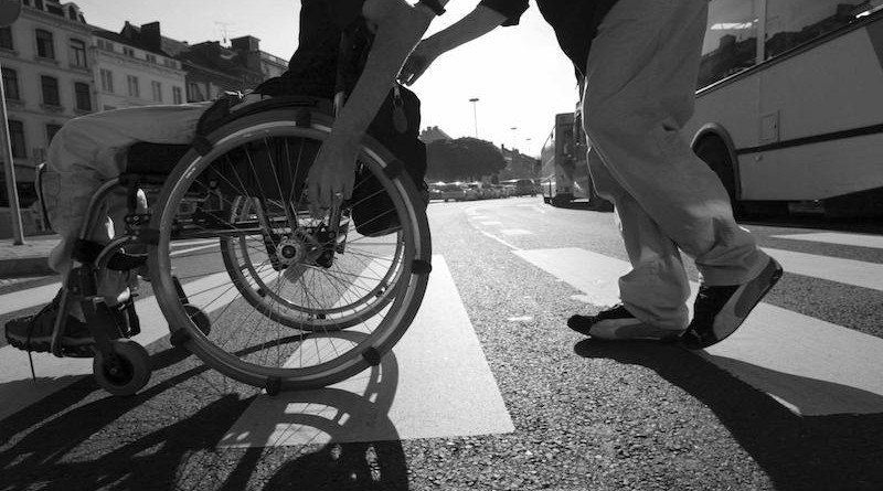 Belgium - Namur 2004 : Living in a  wheelchair (PHOTO/REPORTERS  John Thys)  Model Release Cf/ Car for handicapped persons -  Physically - Disability - Social Security - Social Insurance - Mutual - Mutuality - Wheelchair - Physical disability - Social Security - Social Insurance  -  Medical wheel chair -  Accident - Paralysis - Paralysed - Invalid disabled person - Security safety - Belt seat - Transport - Phone Booth  - Phone Booth inadapted for the disabled person