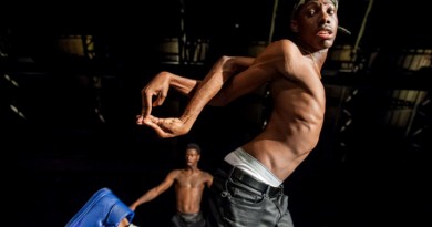 In this August 15, 2014 photo provided by the Park Avenue Armory, dancers Sean Douglas (Brixx) foreground and Derick Murreld (Slicc) rehearse for a show called FLEXN, co-directed by Peter Sellars, at the Park Avenue Armory in New York. The emotionally charged performance by 21 African-American dancers explores social and criminal justice issues through dance, photography and public dialogue. (AP Photo/ Park Avenue Armory, Stephanie Berger) MANDATORY CREDIT