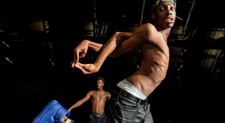 In this August 15, 2014 photo provided by the Park Avenue Armory, dancers Sean Douglas (Brixx) foreground and Derick Murreld (Slicc) rehearse for a show called FLEXN, co-directed by Peter Sellars, at the Park Avenue Armory in New York. The emotionally charged performance by 21 African-American dancers explores social and criminal justice issues through dance, photography and public dialogue. (AP Photo/ Park Avenue Armory, Stephanie Berger) MANDATORY CREDIT