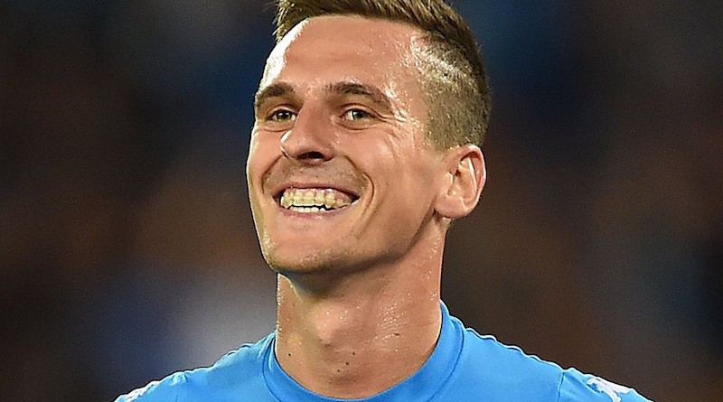 NAPLES, ITALY - AUGUST 27: Arkadiusz Milik of Napoli celebrates after scoring goal 1-0 during the Serie A match between SSC Napoli and AC Milan at Stadio San Paolo on August 27, 2016 in Naples, Italy.  (Photo by Francesco Pecoraro/Getty Images)