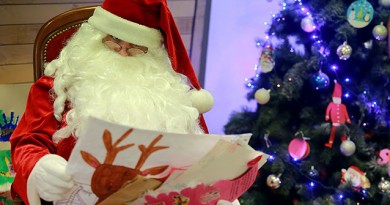 A man dressed as Santa Claus reads Christmas letters sent by children at the Libourne's post office, southwestern France, on December 18, 2015.
A special unit of La Poste, which opened in 1962, employs each year around 60 people to answer letters by children from 140 countries.  / AFP / NICOLAS TUCAT        (Photo credit should read NICOLAS TUCAT/AFP/Getty Images)